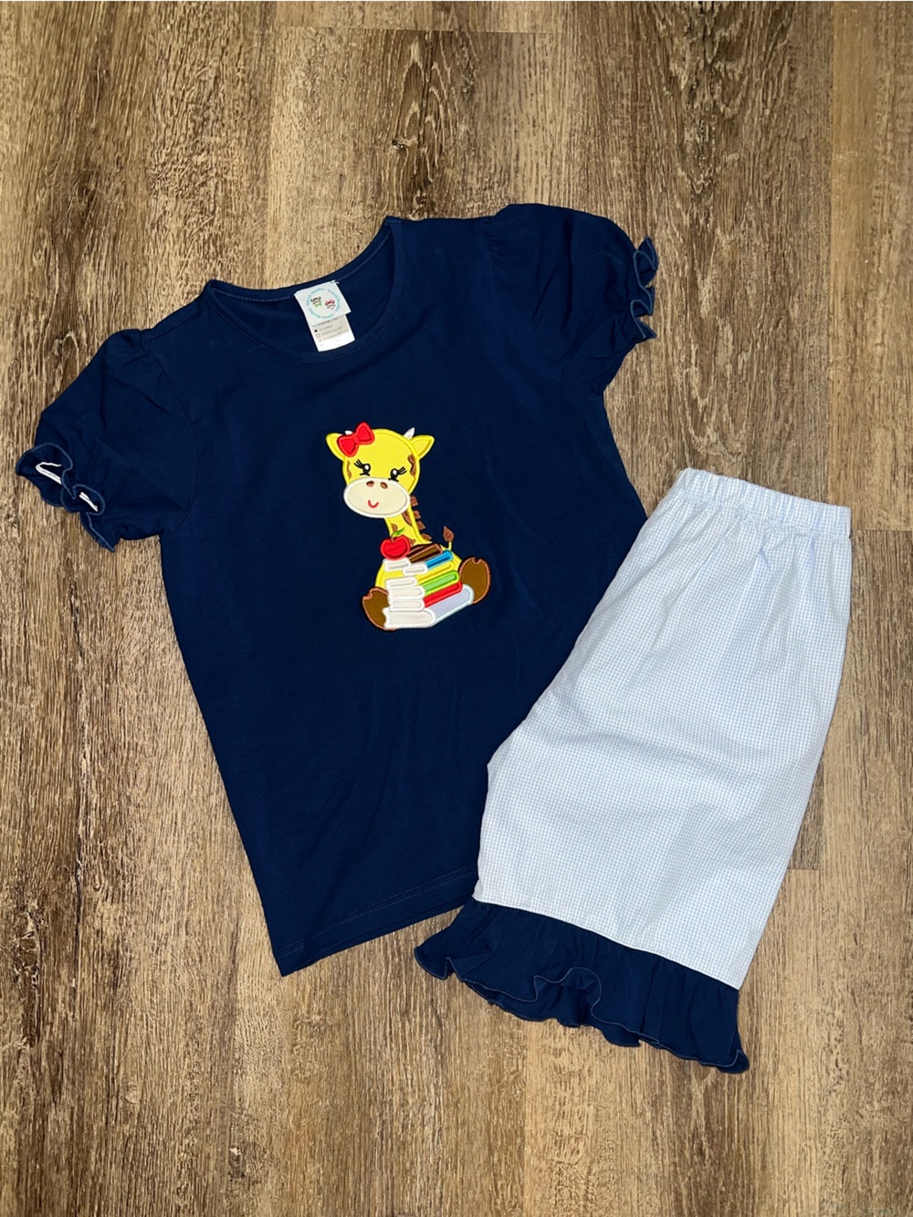 Ruffled Navy Outfit with Cute Giraffe Back to School Appliqué